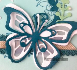 Butterflies abound with three layers creating one focal point.