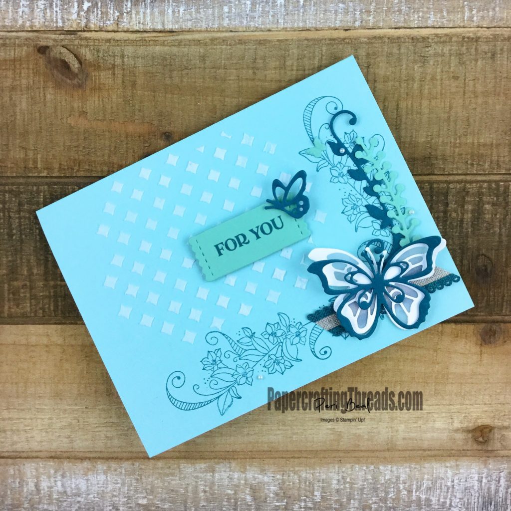 Butterflies abound and embossing paste add much texture and interest