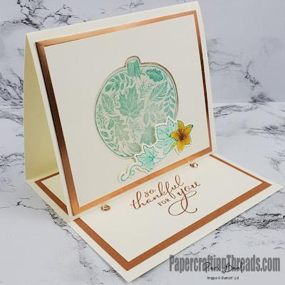 A pop-up Easel Tealight Card with a  front view of a glowing Bermuda Bay pumpkin is perfect for World Kindness Day and Friendsgiving.