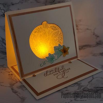 Turn on the battery operated tea light and be entranced with the glowing Bermuda Bay pumpkin in this Easel Tealight Card.