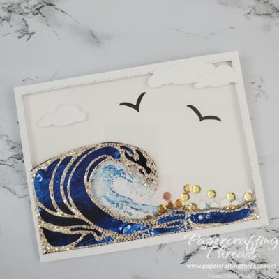 Sample of shaker card with a wave, seagulls and puffy clouds