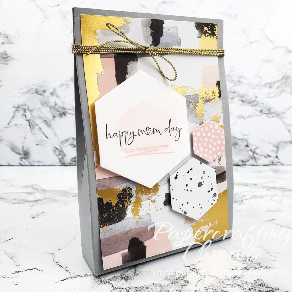 Gift Bag with abstract gold, pink, black and gray pattern and hexagons scattered on front for Mother's Day