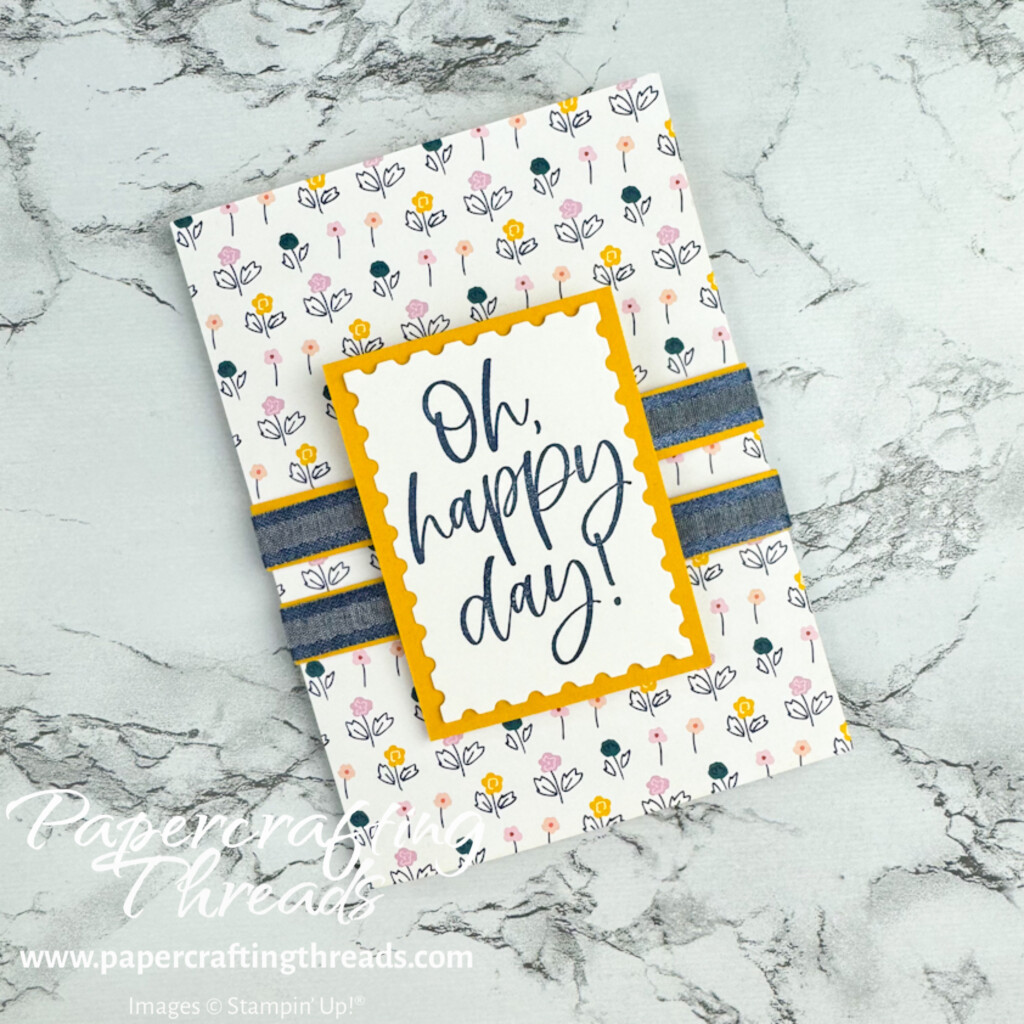 Tri Fold Gift Card Holder front with tiny blue, pink and yellow flowers scattered over front with large blue Oh happy day sentiment bordered with yellow and two bands of blue and yellow