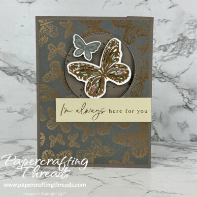 Flap Fun Fold Card in Pebbled Path grey with gold foil butterflies. Two butterflies fly on a cut out circle.
