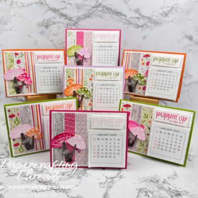 Assorted stand-aloMini Calendars in bright colors with toadstool theme