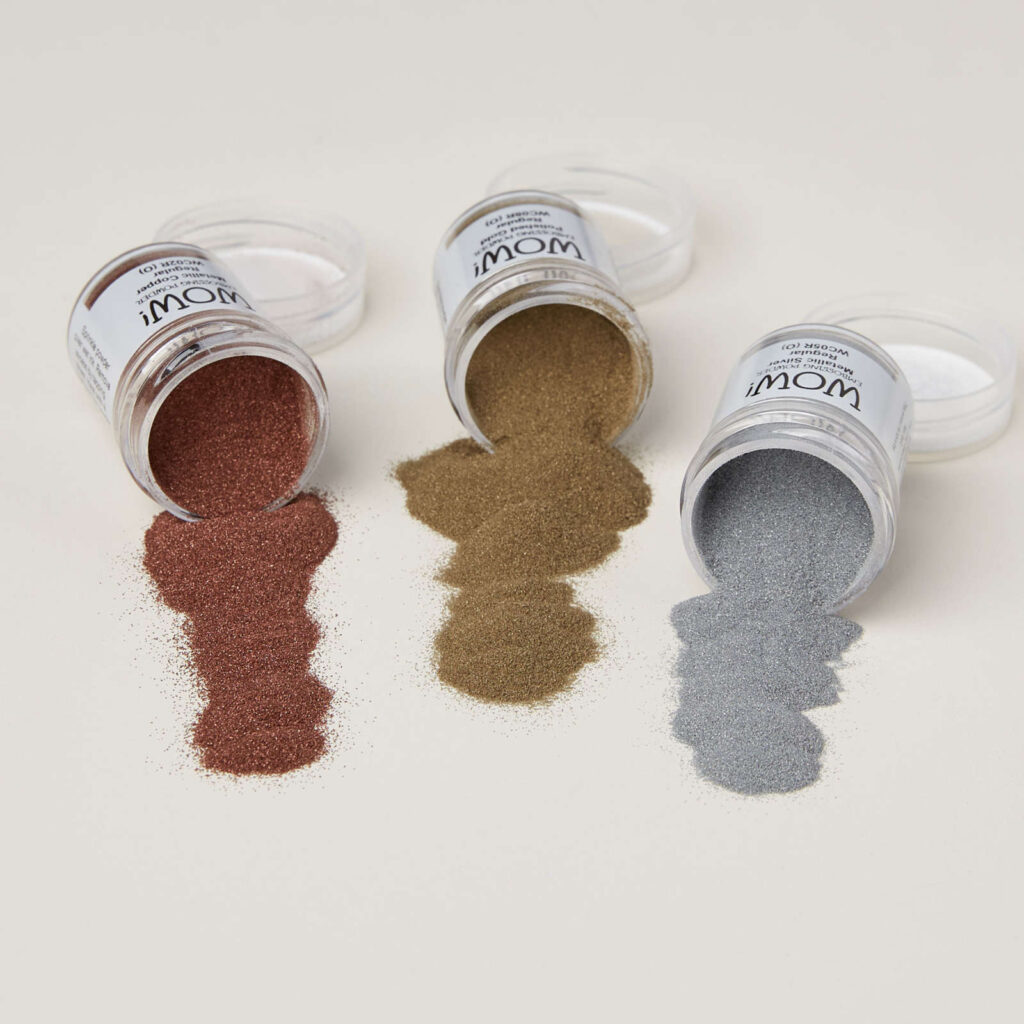 Copper, gold and silver metallic embossing powders.